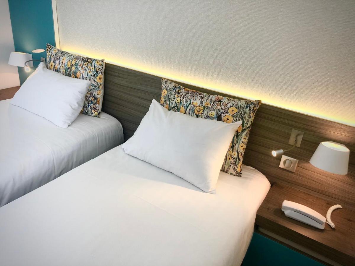 Logis Hotel & Restaurant Les Mouettes - Larmor Plage, Proche De Lorient ภายนอก รูปภาพ