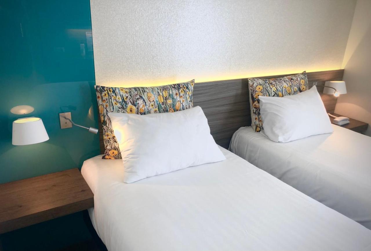 Logis Hotel & Restaurant Les Mouettes - Larmor Plage, Proche De Lorient ภายนอก รูปภาพ